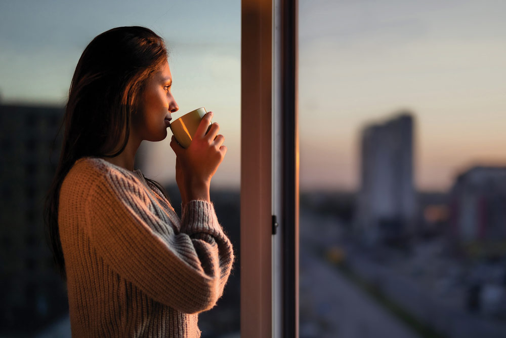 Woman morning coffee in Graystone